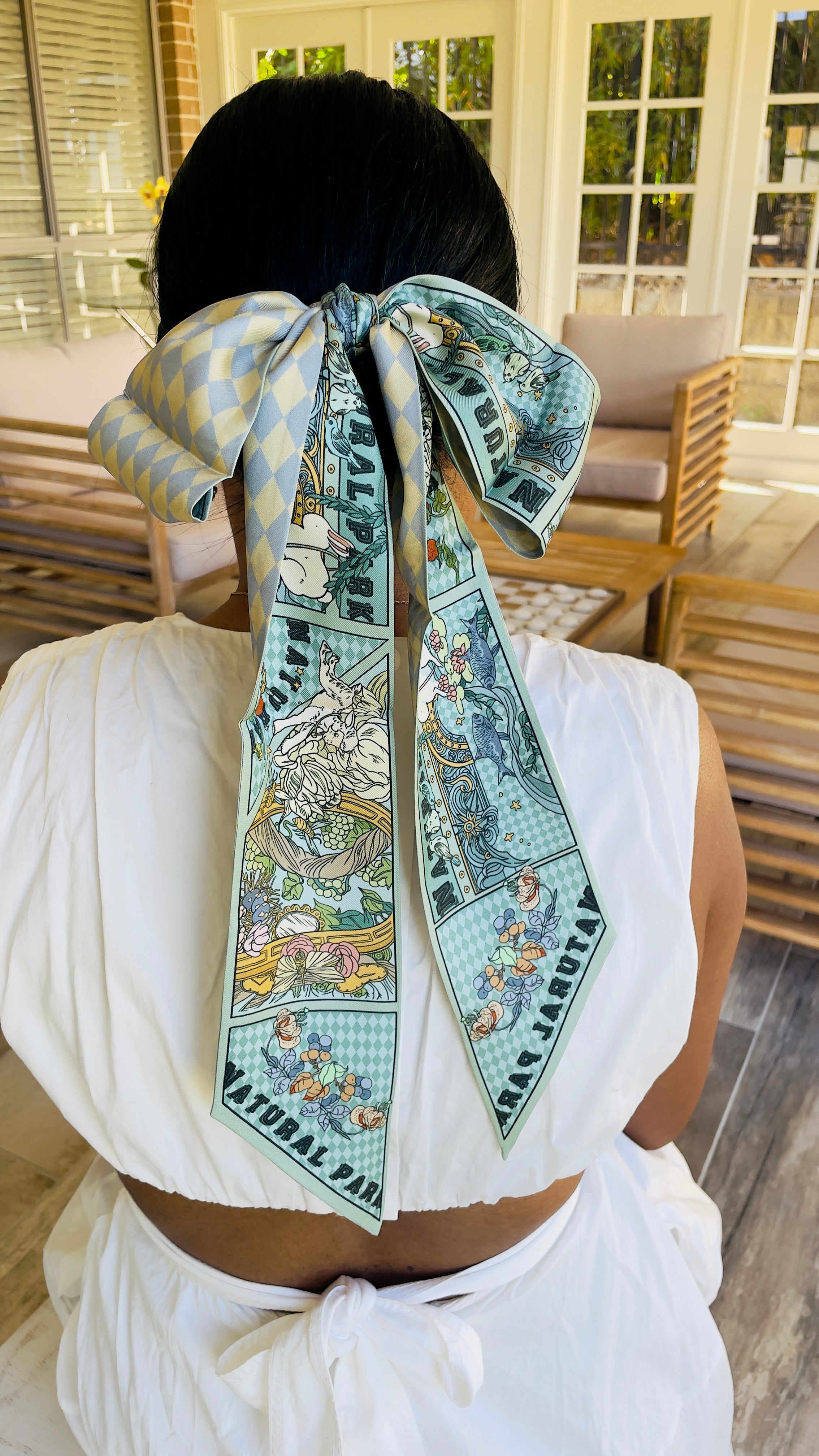 Enchanted Trail Silk Twilly styled as a hair bow