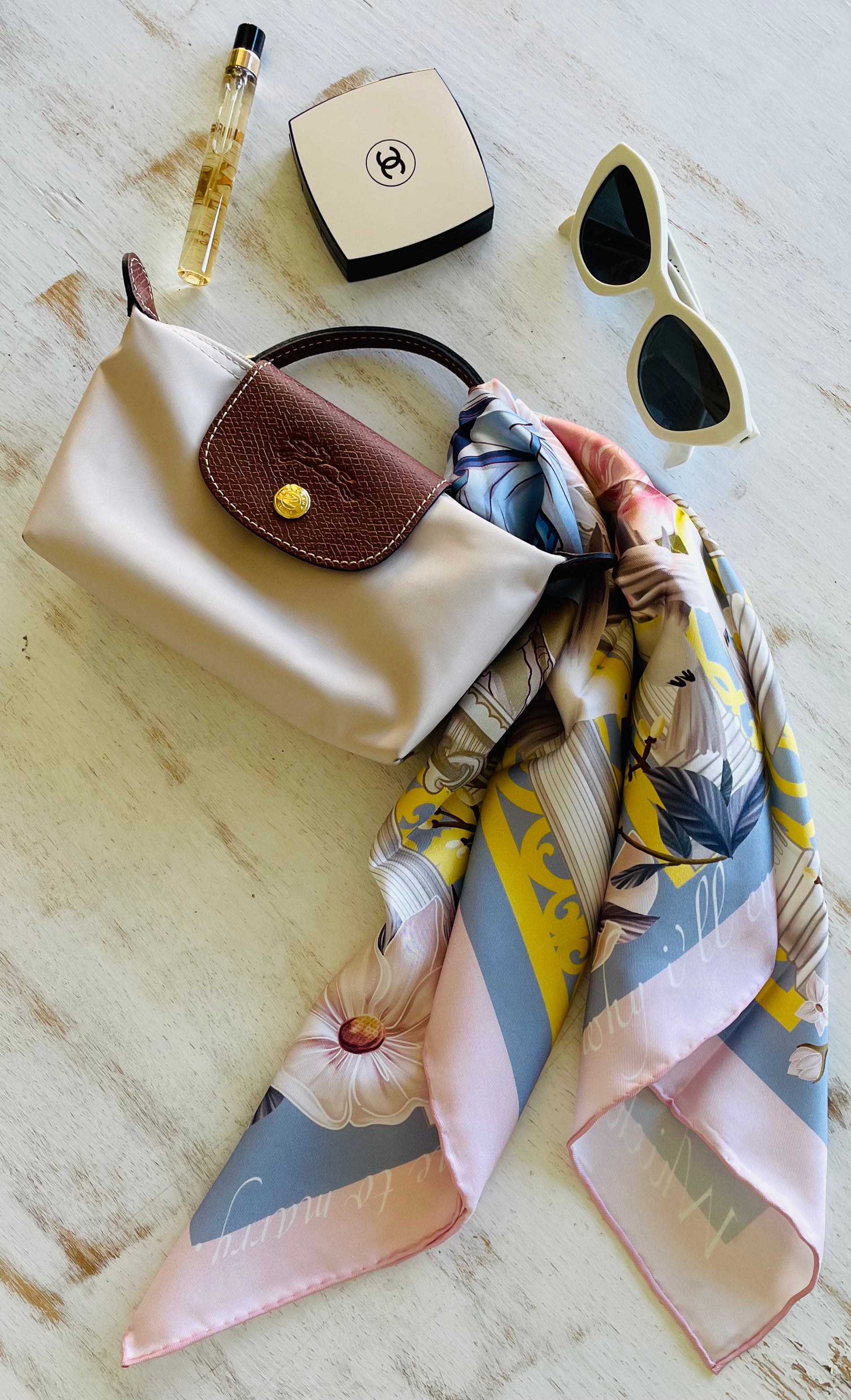 Lily’s Muse Silk Scarf tied as a bag accessory