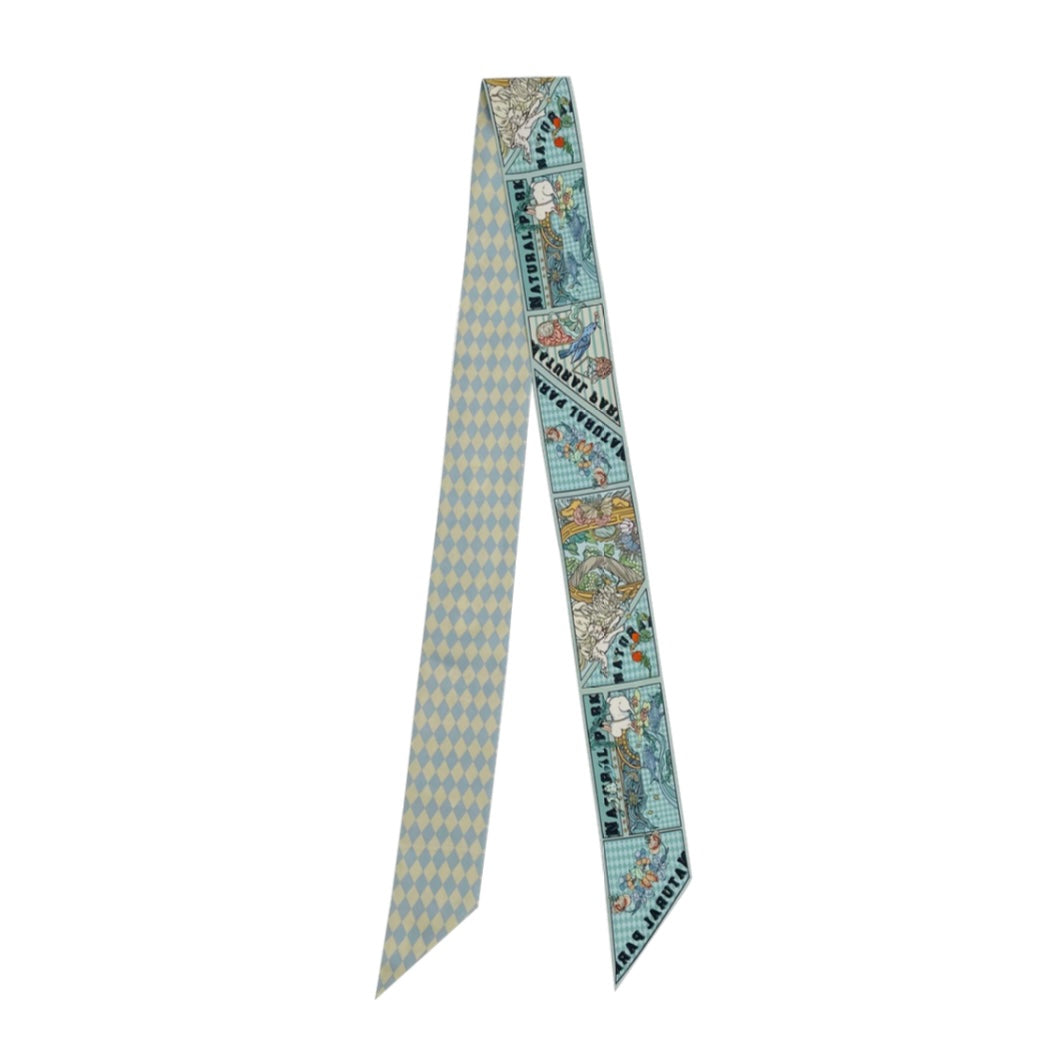 Enchanted Trail Silk Twilly Scarf with whimsical animals, plants, and florals