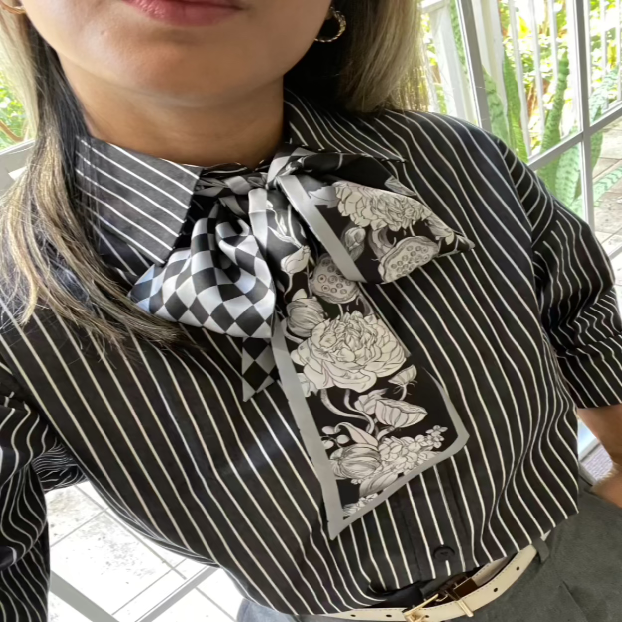 Darling Carré Eclipse Ivy Twilly Silk Scarf tied around the neck